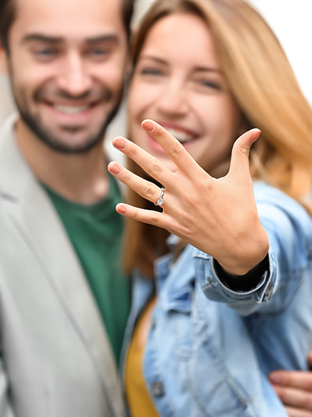 Engagment Proposal, Similing Couple with Lab Grown Diamond Engagement Ring